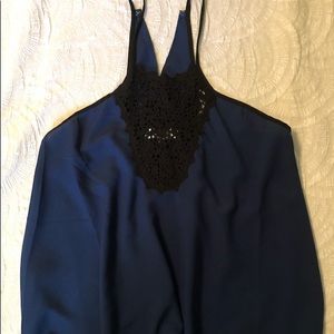 Blue tank with black lace detail.